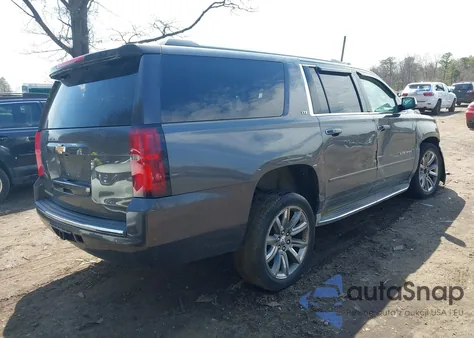 2015 Chevrolet Suburban 1500 Ltz из США, поврежденный, VIN 1GNSKKKC9FR120638
